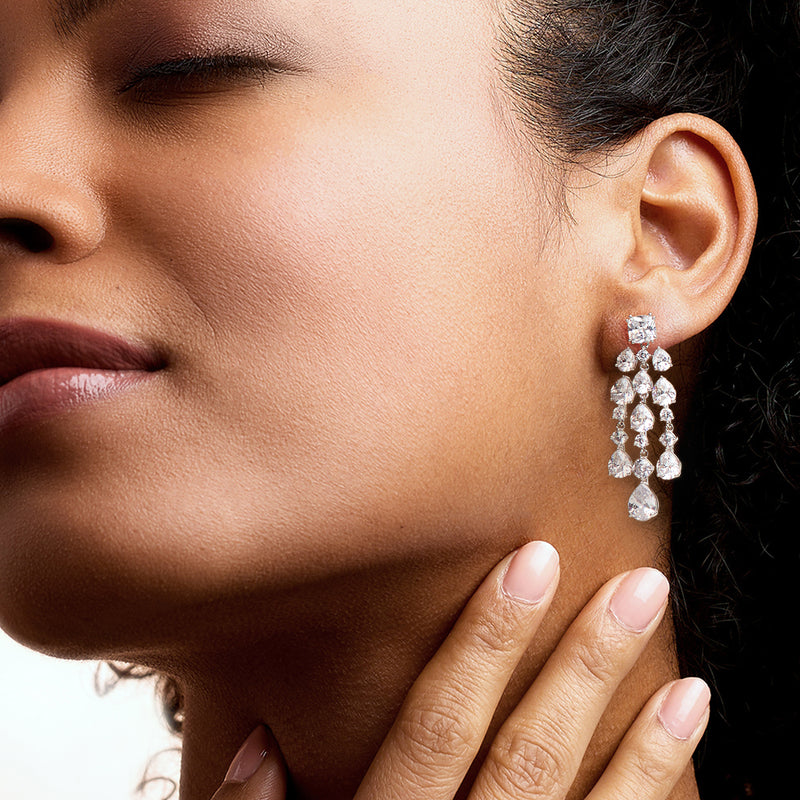 Chandelier drop earrings with sparkling CZ clusters on rhodium-plated silver-tone setting