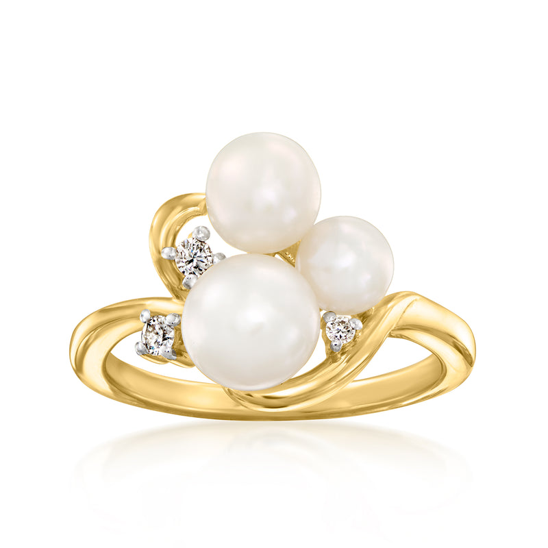 Gold ring with three white cultured pearls and small diamond accents