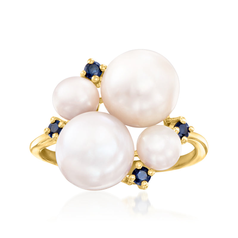 Gold-tone ring with four white cultured pearls and blue sapphire accents