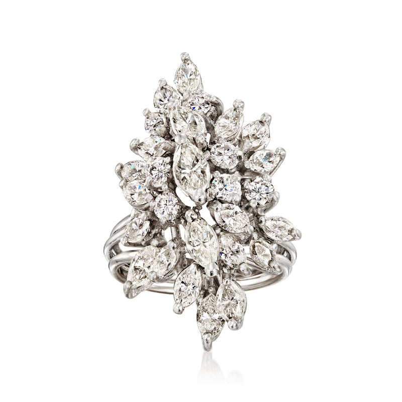 Platinum diamond cluster ring with marquise and pear-shaped stones