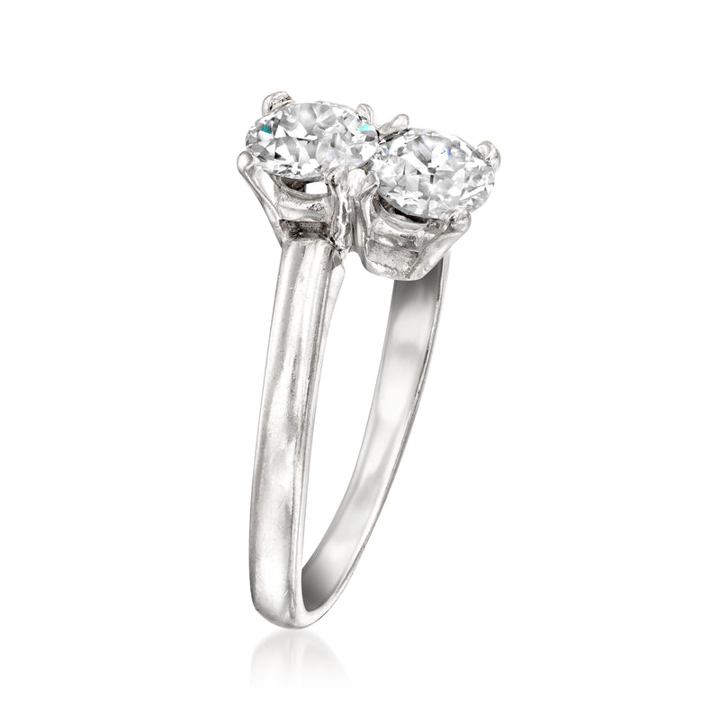 14kt white gold ring with two round diamond clusters in a sculpted setting