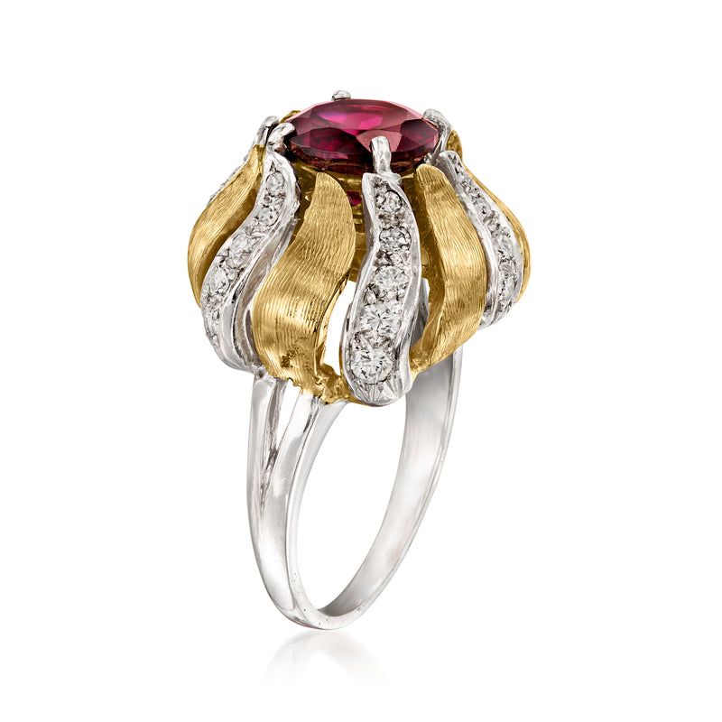 Side view: oval rhodolite garnet ring with diamond-set mounts in gold and platinum