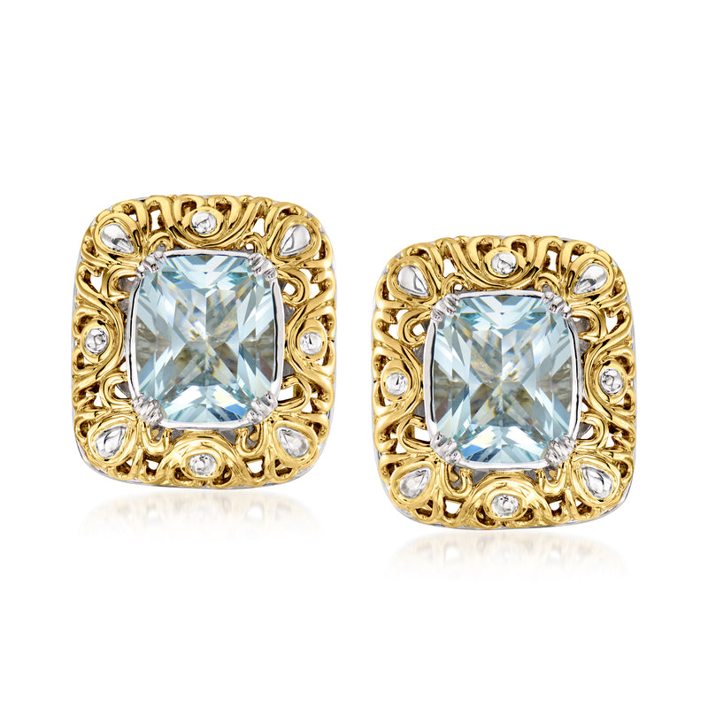 Two-tone gold earrings with square aquamarine-style gemstone and halo of clear stones
