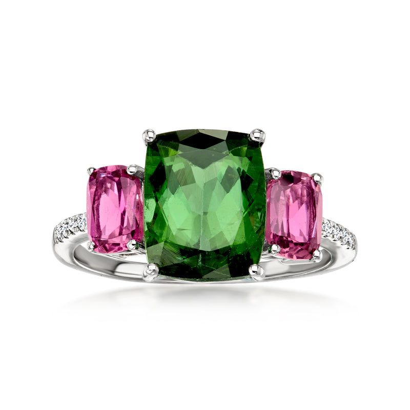 Platinum ring with cushion green tourmaline center, pink side stones, diamond accents