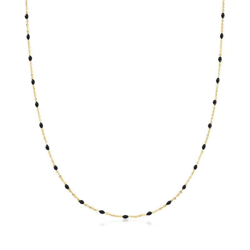 14kt yellow gold station necklace with small black enamel beads in a line