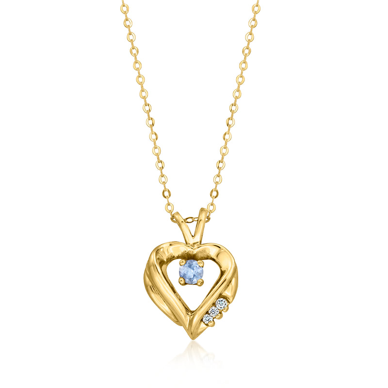 Heart pendant necklace in 10kt yellow gold, blue stone center with white CZ accents