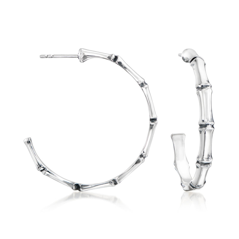 Large sterling silver bamboo-style hoop earrings with segmented curved design