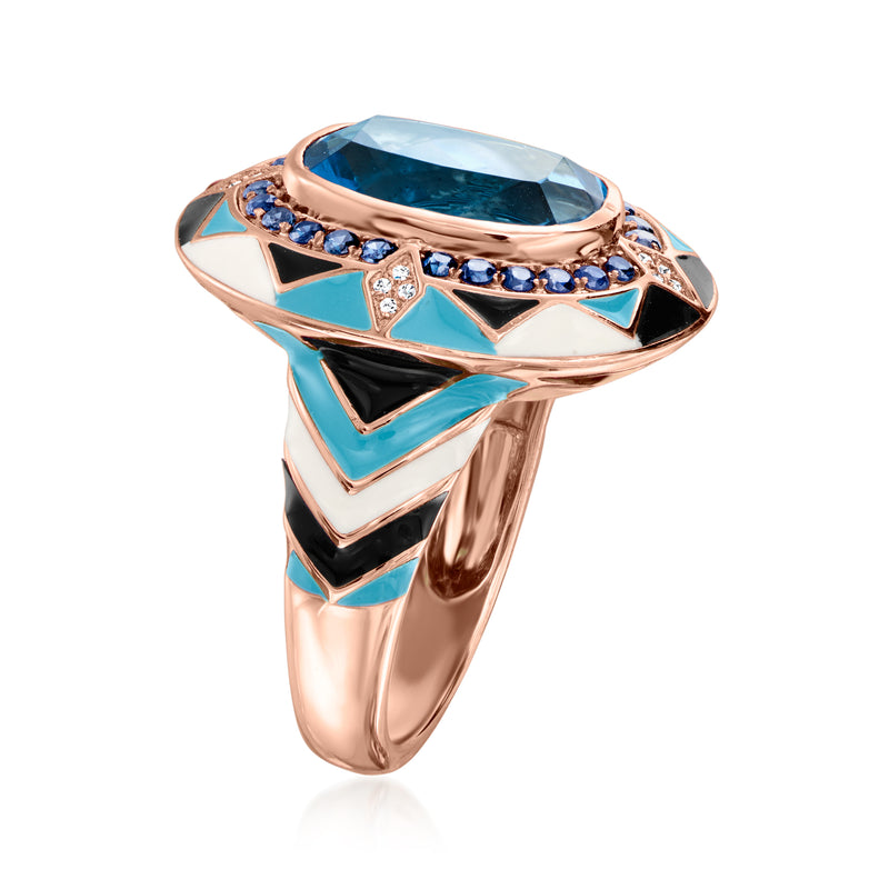 Rose gold vintage ring with blue topaz center, sapphire accents, and multicolor enamel