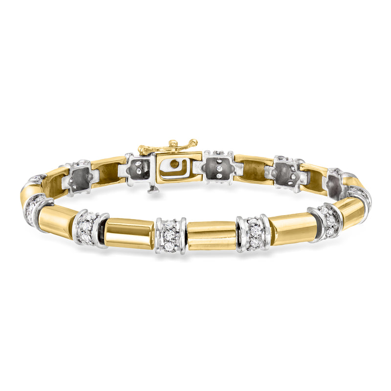 Vintage two-tone gold diamond station bracelet with baguette links