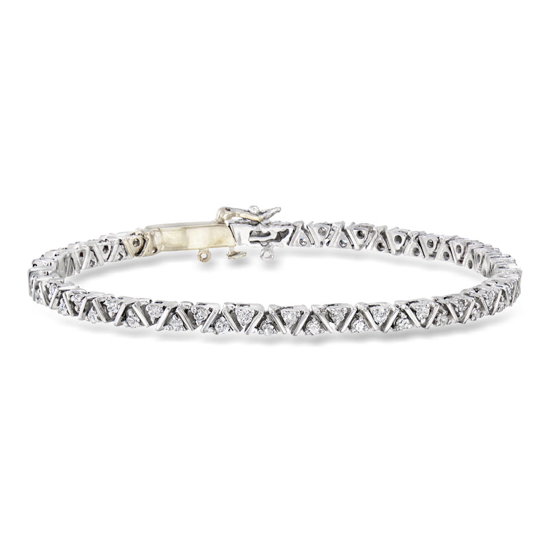 Vintage diamond cluster bracelet in 14kt white gold with linked triangular settings