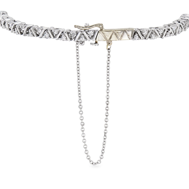 Vintage diamond cluster bracelet in white gold with safety chain