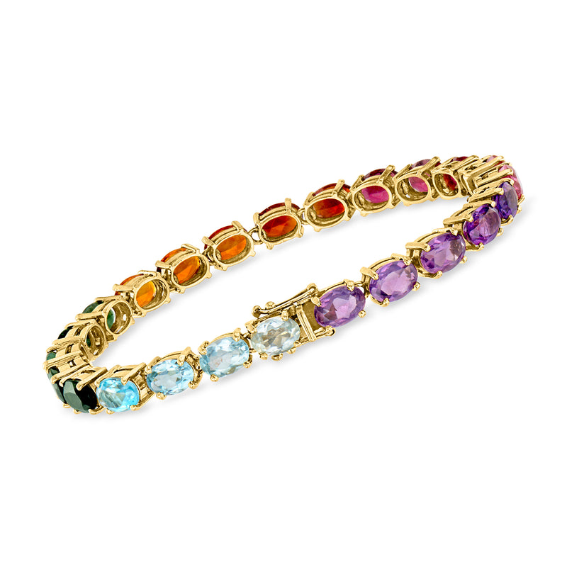 18kt yellow gold multi-gem bracelet with purple, blue, and orange stones