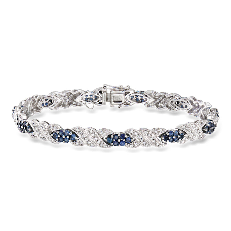 14kt white gold bracelet with blue sapphire oval clusters and diamond accents