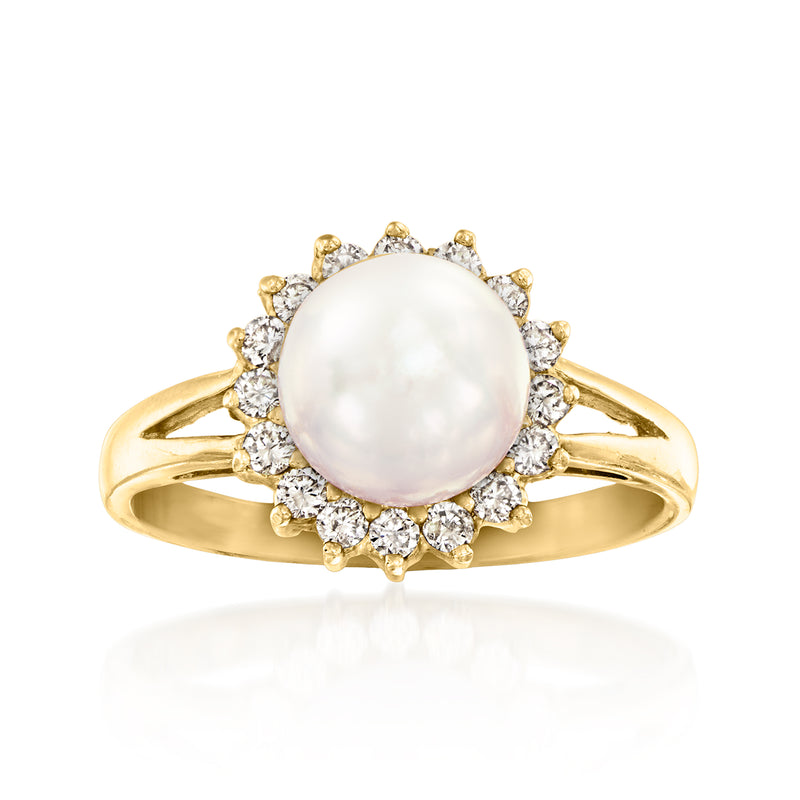 Vintage 14kt yellow gold ring with round cultured pearl and diamond halo