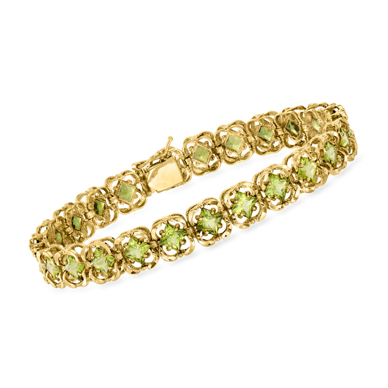 Vintage peridot link bracelet in 14kt yellow gold with green gemstone links
