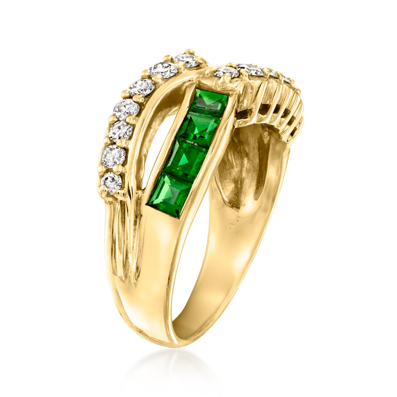 Yellow gold oval crisscross ring with green emerald center and round diamond halo