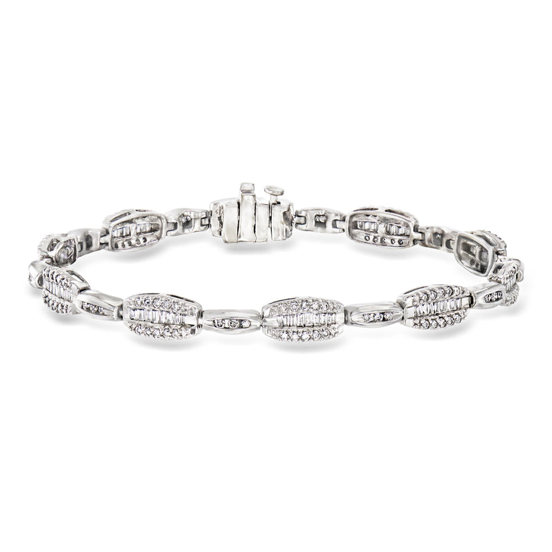 Vintage diamond tennis bracelet in white gold with oval diamond stations and link setting