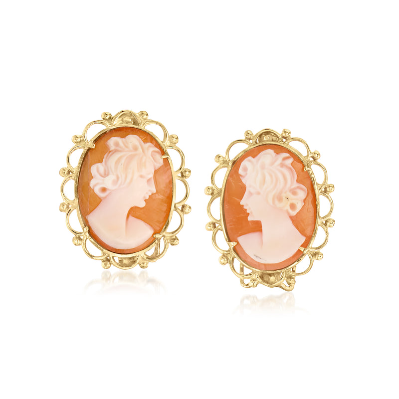 Pair of oval shell cameo earrings in 14kt yellow gold, ornate scalloped border