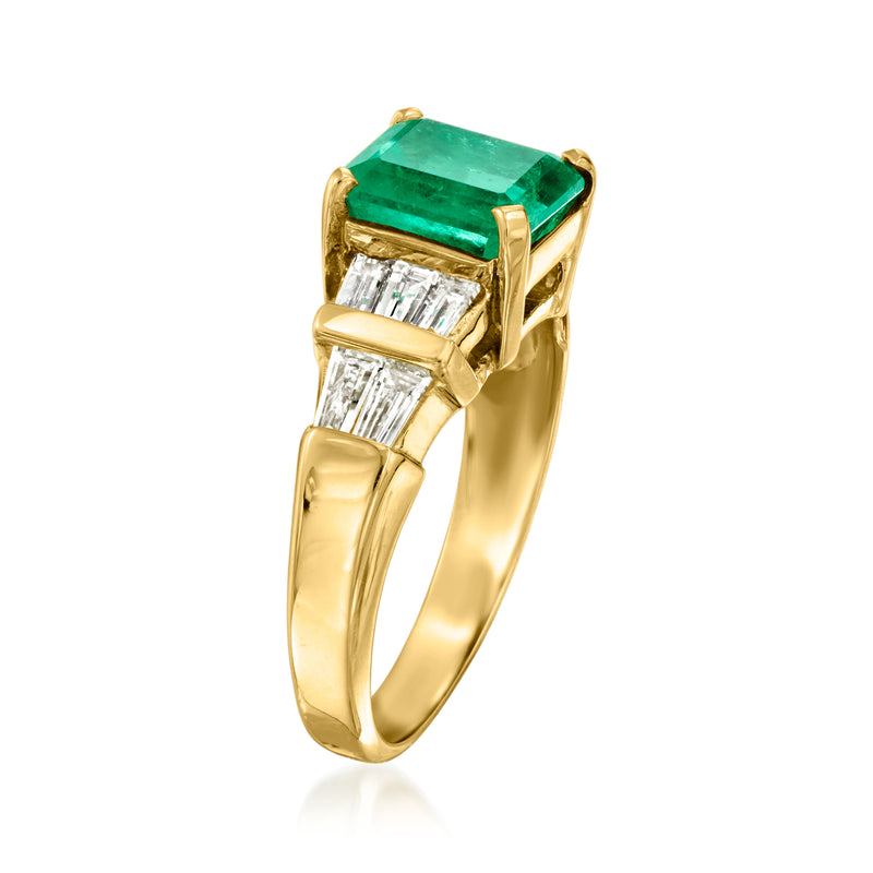 18kt yellow gold ring with emerald-cut green emerald and baguette square diamonds
