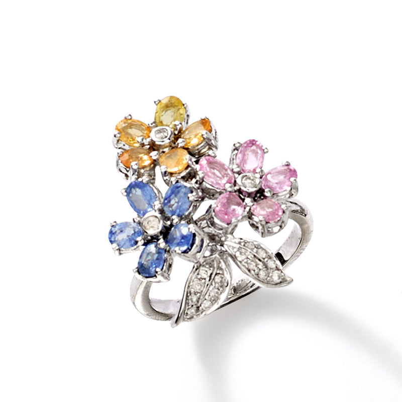 Multicolored sapphire flower ring in white gold with blue, pink, yellow, and orange stones