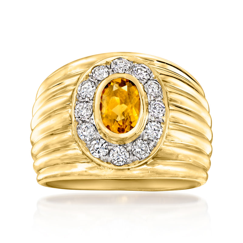 Vintage yellow gold citrine and diamond halo ring with oval citrine center