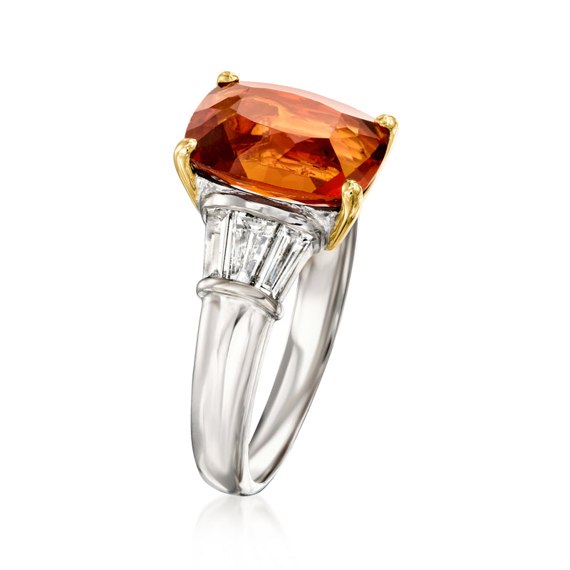 Vintage white gold ring featuring an orange oval gemstone with baguette diamond details