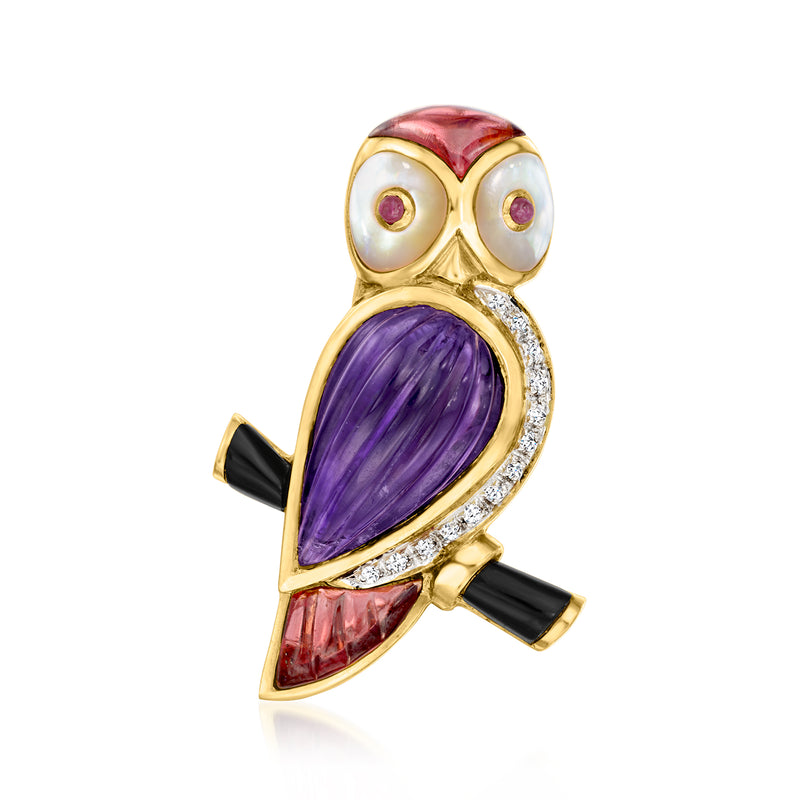Gold-tone owl pin with purple and red stones, black accents, and rhinestone trim