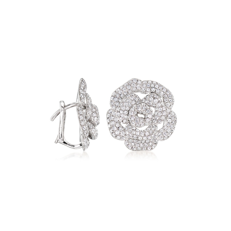 Diamond flower stud earrings with white gold posts and hinged backs