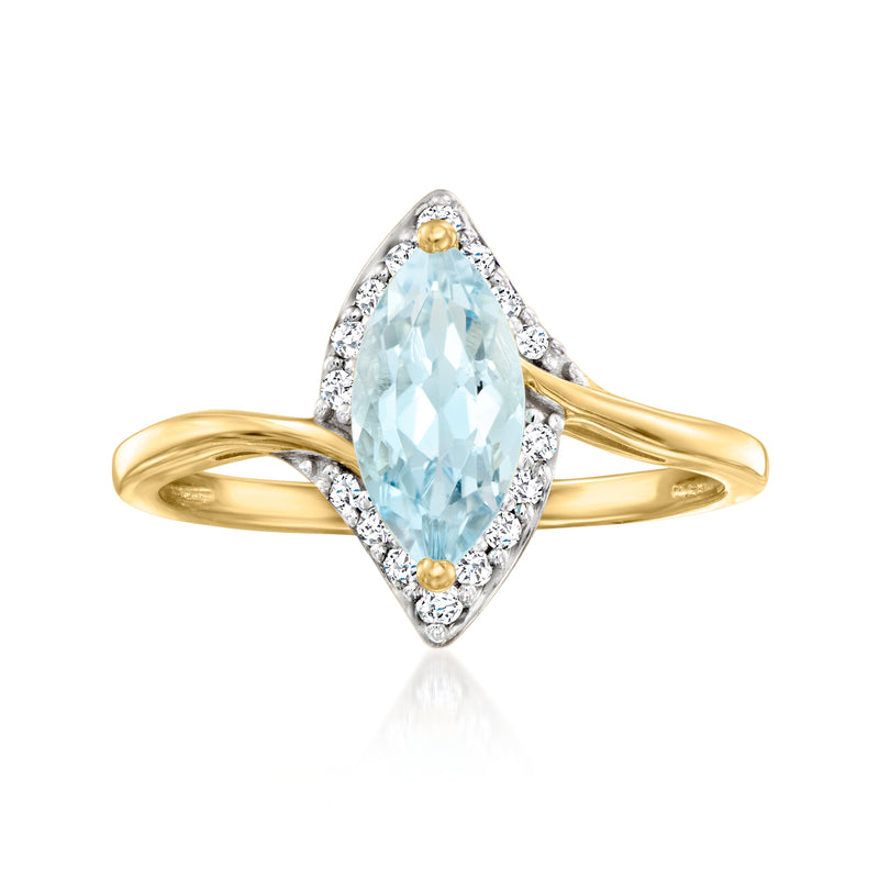 Sky blue topaz ring in yellow gold with white diamond halo and split band