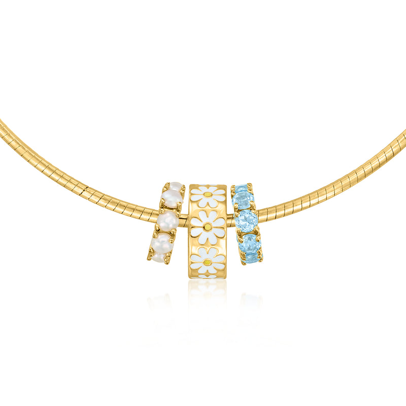 Daisy bead charm centerpiece with white enamel flowers and gold-tone necklace beads