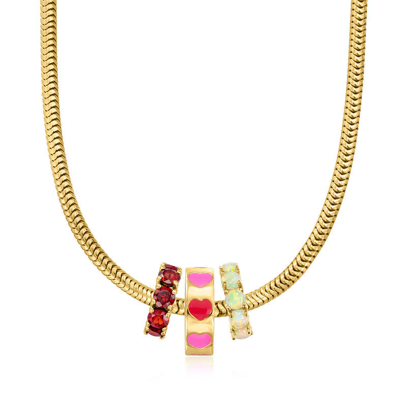 Gold chain necklace with red and pink enamel heart bead charm detail