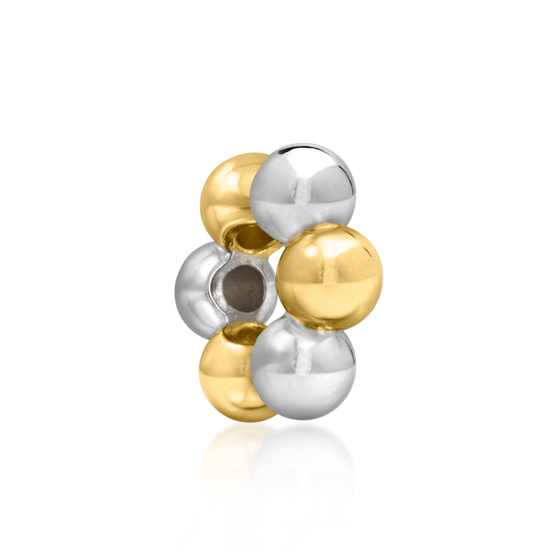 Alternating silver and gold bead charm with circular side opening