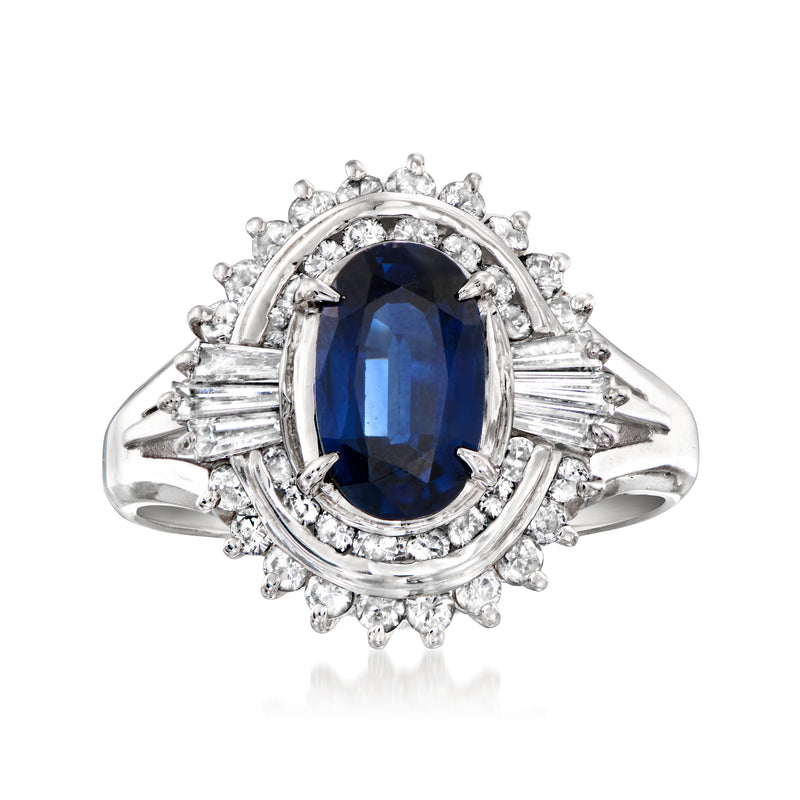 Platinum sapphire and diamond halo oval ring with oval blue center stone