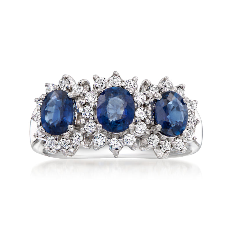 Vintage sapphire and diamond ring, three blue stones, prong-set in white gold