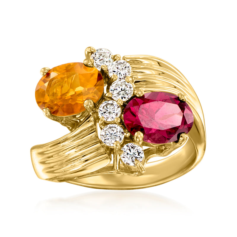 14kt yellow gold ring with oval orange citrine, oval pink gemstone, and round diamond accents