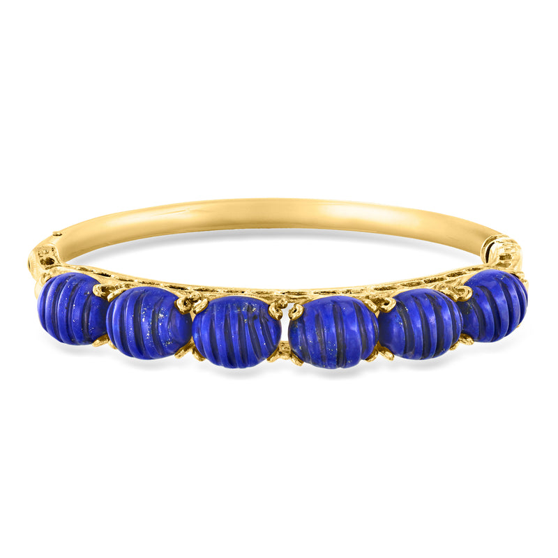 14kt yellow gold bangle bracelet with carved lapis blue disc links