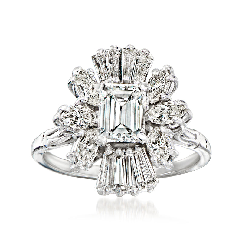 Diamond cluster ring with emerald-cut center and baguette diamonds, white gold setting