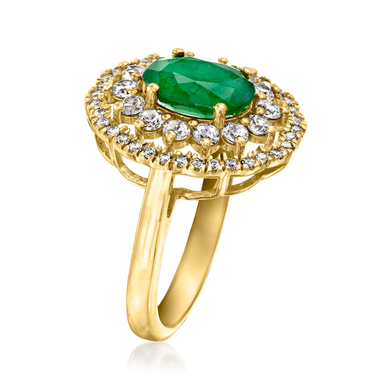 Gold oval emerald-green ring with white stone halo, tall prong setting