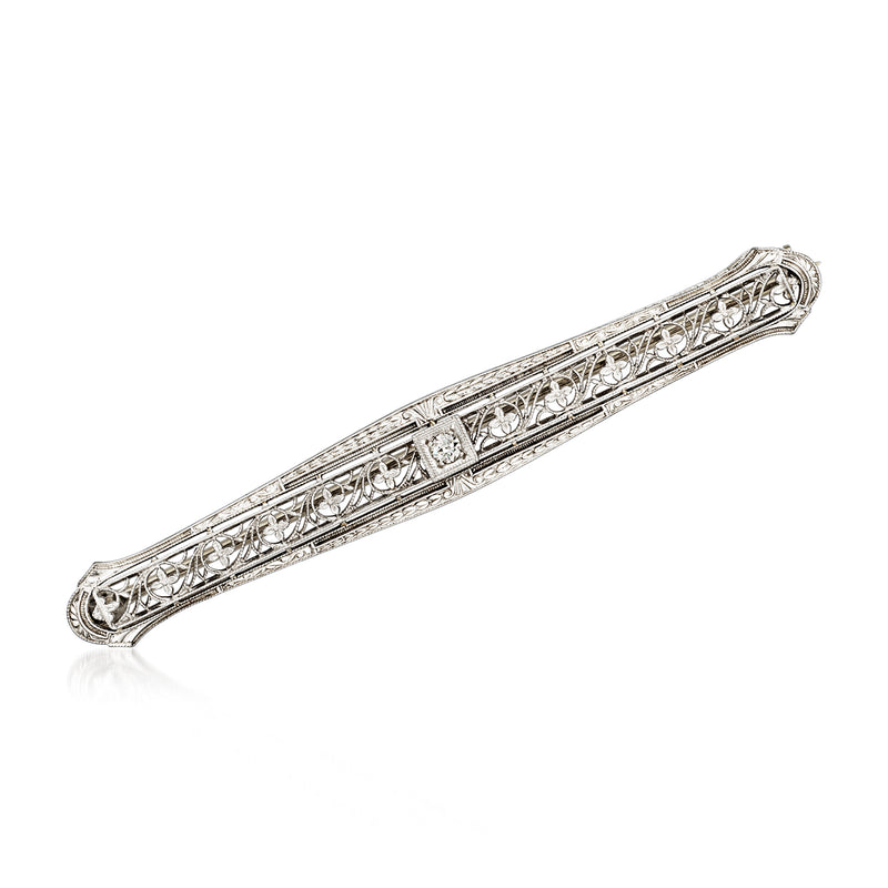 Openwork bar pin in white gold with diamond accents