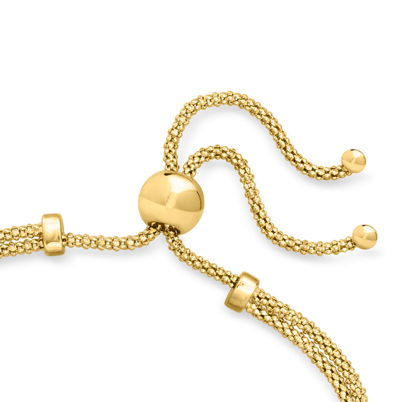 18kt gold over sterling bolo bracelet with two heart charms and dangling chain