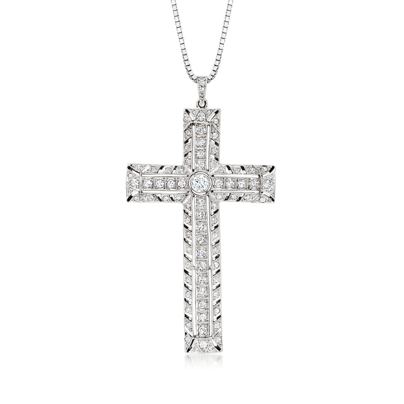 Diamond cross pendant necklace in platinum, vertical baguette and round accents on chain