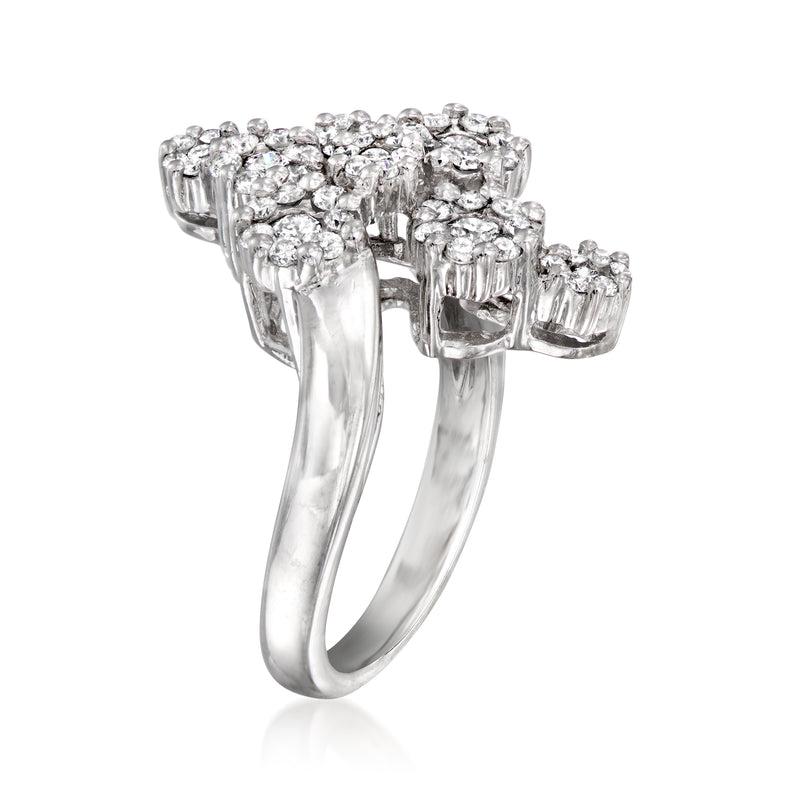 Diamond cluster ring with round stones on square-like prongs, 14kt white gold band