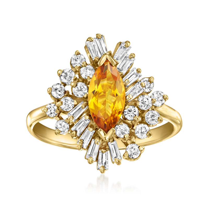 14kt yellow gold ring with oval citrine center and diamond halo, size 7