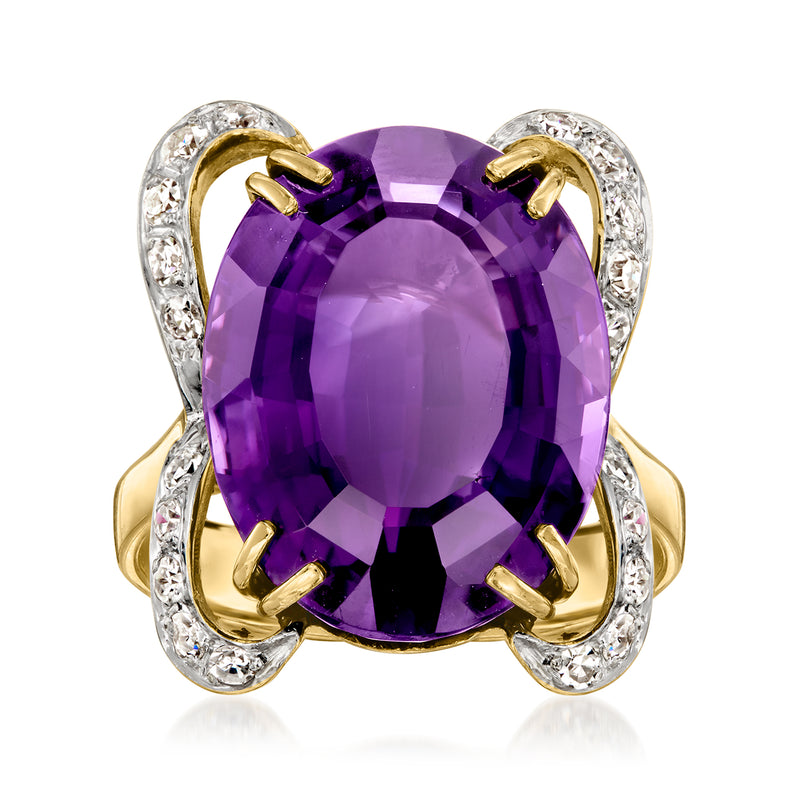 Cushion-cut amethyst center ring in 14k yellow gold with diamond halo