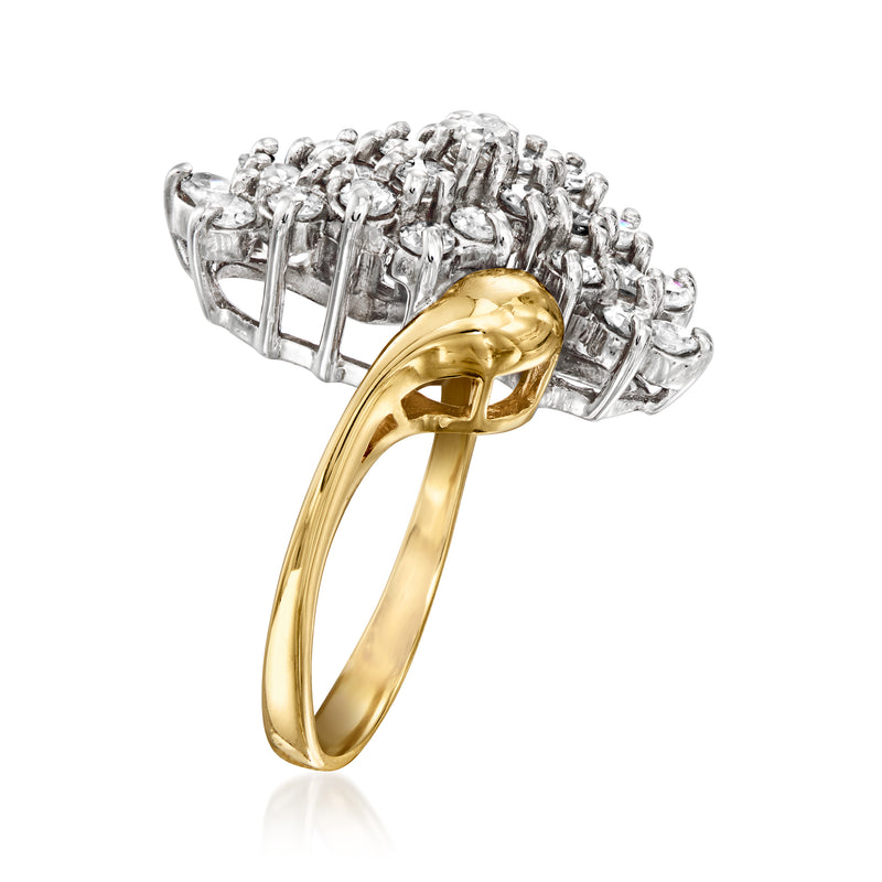 Vintage 14kt yellow gold diamond cluster ring with baguette-style side stones and split shank