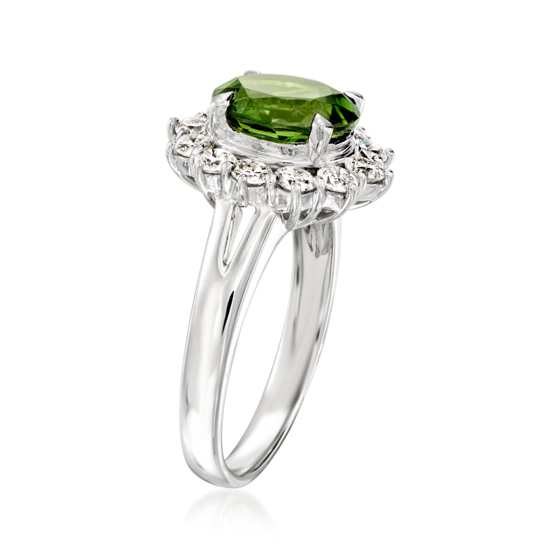 Platinum ring with oval green tourmaline and diamond halo, side angle