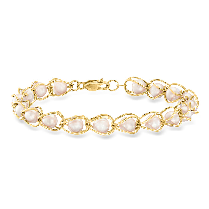 14kt yellow gold caged pearl bracelet with oval pearl links and chain clasp