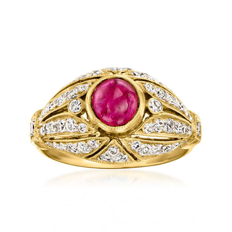 Vintage domed ruby and diamond ring in 18k yellow gold with oval pink cabochon