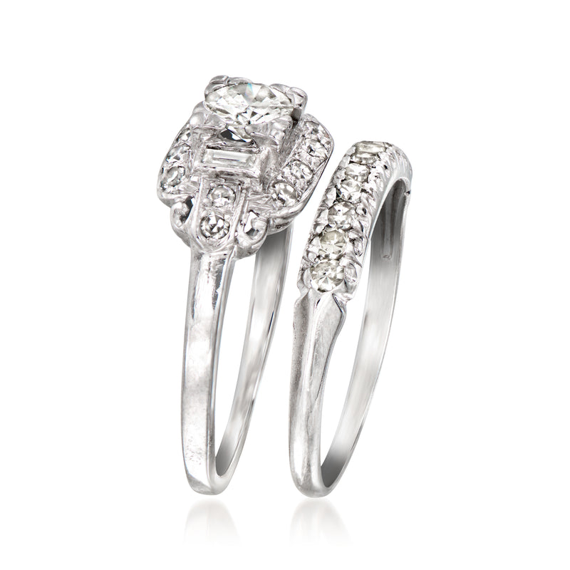 Platinum diamond engagement and wedding rings with prong-set center stones