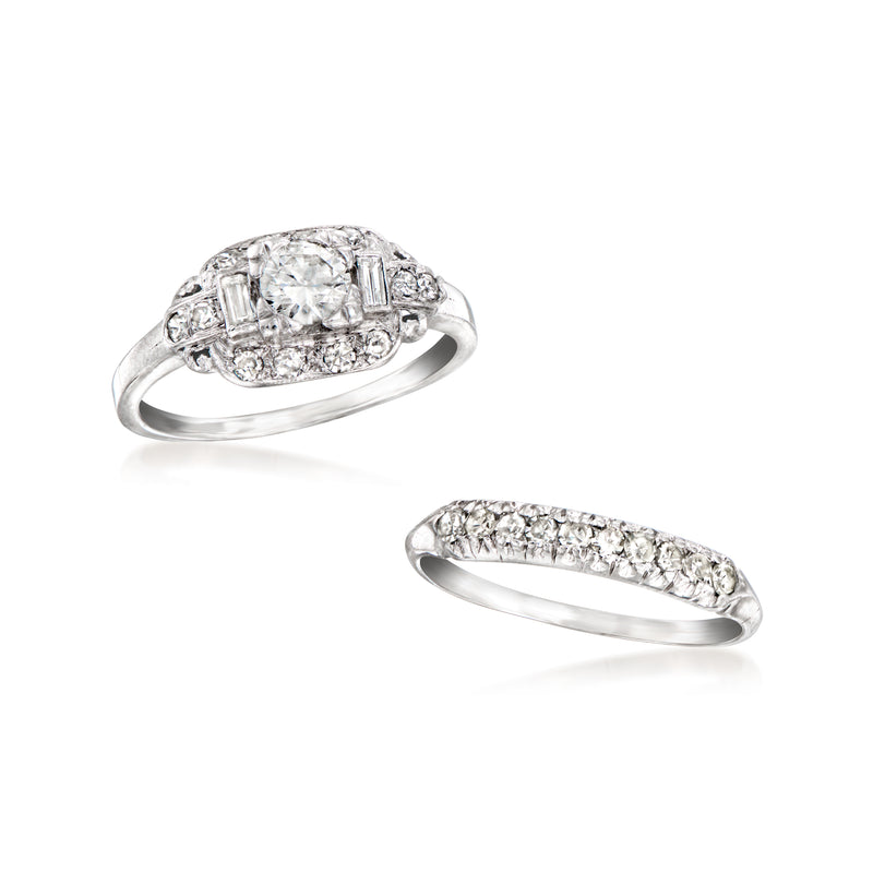 Platinum diamond engagement ring and matching pave wedding band, side view